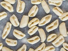 peeled bananas on a baking sheet ready to be cooked