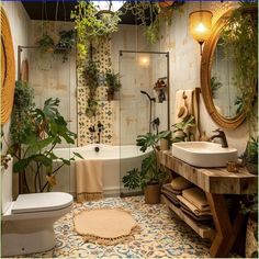 a bathroom with plants on the wall and a bathtub in the middle, surrounded by potted plants