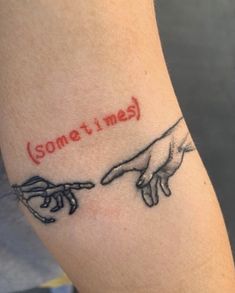 two hands touching each other with the word sometimes written on their arm and behind them