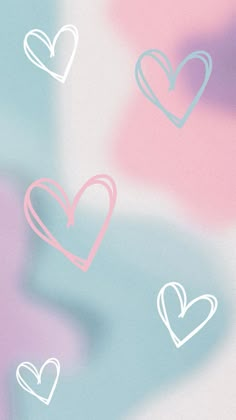 several hearts are drawn on a pastel background