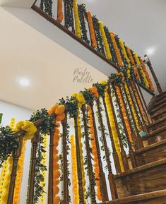 a staircase decorated with flowers and greenery for a wedding or reception in the philippines