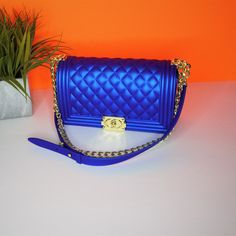 Royal Bea is a beautiful royal blue Woman fashion Handbag. Main material : PVC Shape : Square Closure Type:cover handle :single handle with gold chain Trendy Blue Evening Bag For Party, Luxury Blue Stylish Bag, Luxury Blue Bag As Fashion Accessory, Royal Blue Rectangular Evening Bag, Blue Satchel Shoulder Bag For Party, Formal Blue Bag With Chain Strap, Elegant Blue Crossbody Evening Bag, Formal Blue Shoulder Bag With Chain Strap, Chic Blue Shoulder Bag For Gift