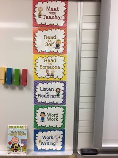 a bulletin board with some writing on it next to a phone and bookshelf