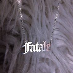 Fatale Necklace ☾ Necklace is solid .925 sterling silver & measures approx 1.25 in. wide x less than half an inch tall. This necklace pairs perfectly with the matching "Femme" necklace, available here. Chain measures 16" long but can be made shorter//longer upon request (leave a note at checkout with your desired chain length). If pairing with another nameplate necklace from the collection, it is recommended to go with an 18" chain so they don't overlap. ❋ ❋ This item is hand crafted for eac Silver Pendant Name Necklace, Custom Name Silver Necklaces, Silver Engraved Name Necklace, Silver Engraved Metal Name Necklace, Sterling Silver Necklace With Custom Name, Sterling Silver Necklace With Custom Name In Silver, Sterling Silver Custom Name Necklace In Silver, Blackletter Font, Font Examples