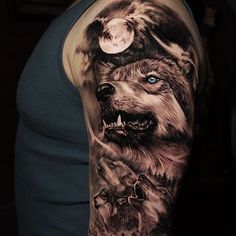 a man with a wolf tattoo on his arm