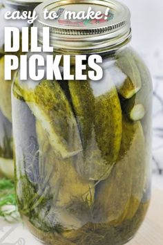 pickles in a jar with text overlay that reads easy to make dill pickles