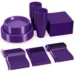 purple plastic plates, forks and napkins on a white background