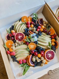 a box filled with assorted fruits and vegetables