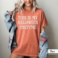 This Is My Halloween Costume Tshirt - Halloween Costume Shirt - Funny Halloween T-shirt - Halloween Party - Gift For Halloween How can I order? 1️) Please review all the information provided before placing an order 2️) Select the shirt type and size. 3️) Select the color of the shirt using the following options. 4️) Need more Items? Add the current item in the cart. And If you like to add more items to your order please press the back button and repeat steps 1-4 again. 5️) Once all your desired This Is My Halloween Costume Shirt, Fall Costume Party Short Sleeve T-shirt, Fall Short Sleeve T-shirt For Costume Party, Fall Short-sleeved T-shirt For Costume Party, Crew Neck Tops With Letter Print For Costume Party, Fall Crew Neck T-shirt For Costume Party, Spooky Letter Print T-shirt For Costume Party, Halloween Costume Party T-shirt With Letter Print, Halloween Costume Party Letter Print T-shirt