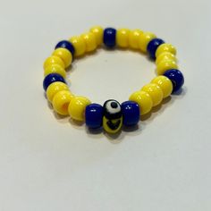 X small minion kid bracelet Blue Adjustable Novelty Jewelry, Yellow Novelty Adjustable Jewelry, Adjustable Novelty Yellow Jewelry, Adjustable Yellow Novelty Jewelry, Playful Adjustable Yellow Jewelry, Fun Yellow Bracelet Jewelry, Playful Yellow Bracelet Jewelry, Minion Bracelet, Christmas Light Necklace