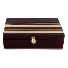 a brown wooden box with gold trimmings on the top and bottom, sitting against a white background