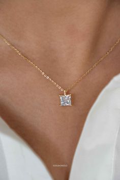 This elegant Princess Cut Solitaire Diamond Necklace is crafted with a high-grade simulated diamond and is plated with 14k gold on sterling silver. It is finished with an anti-tarnish coat and an e-coat for long-lasting preservation of the plating. It's a perfect addition to your jewelry collection and makes a great gift for birthdays, graduations, or for your best friend. PRODUCT DETAILS: * Necklace Length is Adjustable from  15. 5 inches to 17.5 inches with 2 inch of extenders * Comes with 2 i Dainty Cubic Zirconia Solitaire Necklace For Formal Occasions, Dazzling 14k Gold Princess Cut Jewelry, Dazzling Solitaire Jewelry For Anniversary, Delicate Solitaire Jewelry For Formal Occasions, Elegant 14k Gold Solitaire Necklace For Anniversary, Dazzling 14k Gold Jewelry For Anniversary, Classic Princess Cut Cubic Zirconia Jewelry, Gold Moissanite Jewelry For Anniversary, Delicate White Gold Jewelry With Vs Clarity