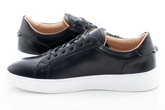 Supple material and a sophisticated low-top silhouette create a versatile, sporty look to this handsome dress sneaker with a timeless lace-up design and thick outsole. A suave, confident addition to your outfit that pairs nicely with a wide range of formal jackets or casual attire. Men's Lace-Up Sneaker PU Leather Upper Synthetic Sole Low-Top Heel Wide-Laces Thick Outsole Imported Modern Custom Lace-up Sneakers With Textured Sole, Modern Lace-up Sneakers With Stitched Sole, Modern Lace-up Shoes With Contrast Sole For Streetwear, Modern Low-top Lace-up Shoes With White Sole, Sporty Lace-up Shoes With Contrast White Sole, Classic Lace-up Sneakers With Contrast Sole, Low-top Lace-up Shoes With Textured White Sole, Modern Custom Sneakers With Textured Sole, Black Casual Custom Sneakers With Plain Toe