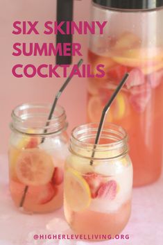 two mason jars filled with water and lemons next to a pitcher full of drinks