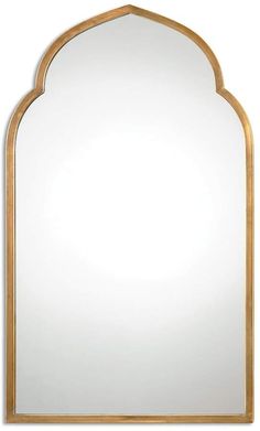 an arched mirror with gold trimmings and a wooden frame on the front side