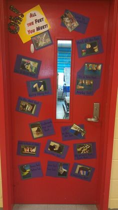 a red door decorated with pictures and magnets