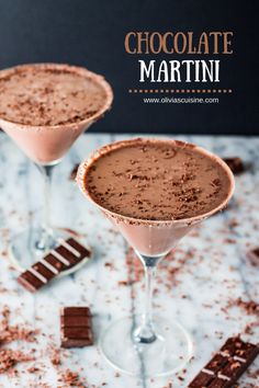 two glasses filled with chocolate martinis on top of a table