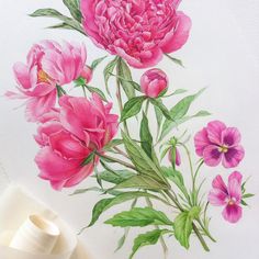 a painting of pink flowers on a white surface next to a roll of toilet paper