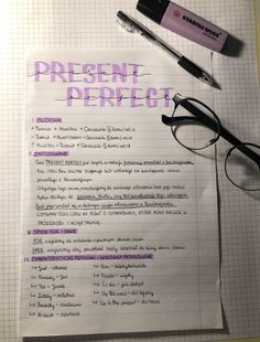 a piece of paper with writing on it next to a pen and eyeglasses