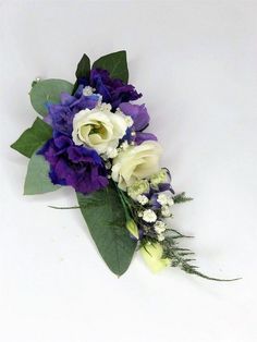 a purple and white flower bouquet on a white background