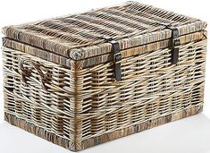 an empty wicker basket with handles on a white background