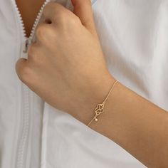 This delicate infinity heart bracelet is elegant and classic. It adds a charmingly feminine touch to any style with its traditional heart and infinity design. Give it to someone you want to spend the rest of your life with. You'll have- 14k solid gold handcrafted bracelet- 100% US sourced jewelry Size - Material: 14k Solid Gold & Diamond- Diamond carat: 0.01 ct (H Color, SI clarity)- Charm Height: 10 mm- Charm Width: 12 mm- Chain Style: Cable Chain You’ll get a certificate of authenticity with e Knot Jewelry, Gold Heart Bracelet, Infinity Heart, Bracelets Gold Diamond, Elegant Bracelet, Bracelet For Women, Diamond Bracelets, Gold Set, Gold Heart