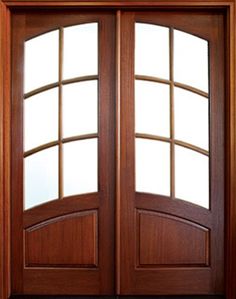 an open wooden door with glass panels on the top and bottom part, showing two windows