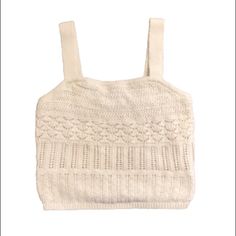 Abercrombie & Fitch Crochet Crop Top Size Large Cream/Beige Color Never Worn, In Excellent Condition. No Flaws. It Has A Layer Of Material On The Inside, So It Is Not See Through. It Is A Thicker Crochet Material! Super Cute! Approximate Measurements: Total Length: 18.5 Inches Length Excluding Straps: 12.5 Inches Width: 14.5 Inches Strap Width: 1.35 Inches Smoke Free Home. Same Day/Next Day Shipping. See Anything Else In My Closet That Catches Your Eye? I Offer 25% Off 4 Or More Items. Let Me Kn White Knitted Sleeveless Crop Top, White Sleeveless Knitted Crop Top, White Casual Crop Top With Crochet Trim, Casual White Crop Top With Crochet Trim, White Pointelle Knit Crop Top, Chic White Crochet Top For Winter, White Crochet Lace Knit Top, White Crochet Lace Top For Winter, Cream Beige Color