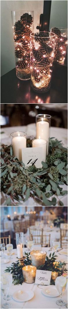 candles are lit on the table with greenery around them and surrounded by small glass vases