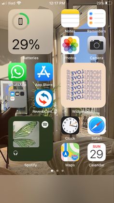 an iphone screen showing the home screen with various icons and numbers on it, as well as other items