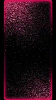 a black square with pink speckles on it