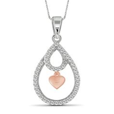 A beautiful take on the traditional heart pendant, this studded diamond pendant is sure to capture any heart. The classic heart shape is one of the most popular and universally accepted symbols of love... and what can express your true love better than our diamond heart pendant? Show family, friends, or that special someone how much they mean to you with our dazzling heart pendant. Our Two Tone Sterling Silver heart pendant is the perfect gift for expressing your love. Its the perfect present fo Sterling Silver Diamond Cut Heart Necklace For Mother's Day, Sterling Silver Diamond Cut Heart Pendant Jewelry, Diamond Heart Pendant Necklace For Mom, Silver Heart Cut Necklace With Hallmark, Sterling Silver Teardrop Jewelry With Heart Charm, Mother's Day Sterling Silver Heart Necklace With Diamond Cut, Silver Teardrop Necklace With Heart Charm, Teardrop Jewelry For Mother's Day Anniversary, Teardrop Jewelry For Anniversary And Mother's Day