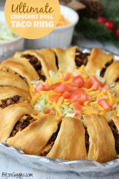 the ultimate crescent roll taco ring is ready to be eaten