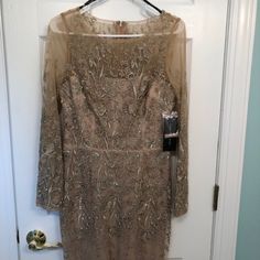 This Dress Is Gorgeous, Never Worn, New With Tags! Sheer Layer Of Pale Mauve With Delicate Embroidery Of Pale Green Leaves/Pink Flowers And Beaded Throughout, Over Beige Lining. Sheer Embroidery/Beads Continue At The Neckline & On Long Sleeves And The Flower Design Tapers At The Hem. Tailored Waist, Zipped Back. This Elegant Dress Is Perfect For Cocktail, Evening Or Wedding Attire. Originally Sold By Neiman Marcus. Long Sleeve Mother Of The Bride Evening Dress, Mother Of The Bride Long Sleeve Evening Dress, Elegant Fitted Evening Dress With Intricate Embroidery, Elegant Party Gown With Intricate Embroidery, Elegant Fitted Gown With Intricate Embroidery, Elegant Party Evening Dress With Intricate Embroidery, Elegant Party Dress With Intricate Embroidery, Glamorous Lace Long Sleeve Mother Of The Bride Dress, Glamorous Long Sleeve Lace Mother Of The Bride Dress