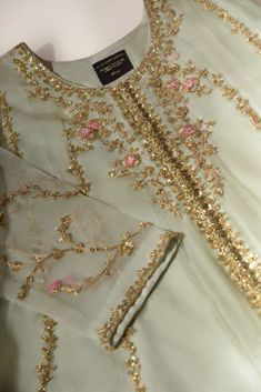 Gold Anarkali Sherwani With Dupatta, Elegant Traditional Wear With Gota Work For Festivals, Gold Sharara In Raw Silk With Intricate Embroidery, Gold Intricate Embroidered Raw Silk Sharara, Festive Chinon Anarkali Set With Intricate Embroidery, Elegant Traditional Wear With Gota Work, Elegant Traditional Wear With Gota Work For Designer Wear, Elegant Traditional Wear With Gota Work For Party, Elegant Traditional Wear For Party With Gota Work