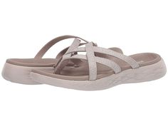 SKECHERS Performance On-The-Go 600 - Dainty - Women's Sandals : Taupe : The SKECHERS Performance On-The-Go 600 - Dainty sandal will complement your effortlessly chic summer style with a strappy silhouette, easy slip-on styling, and a machine washable design. Woven knit mesh fabric upper features a heathered finish. Open toe with center thong post for a secure fit. Signature logo accent at the side strap. Breathable fabric strap lining. Goga Mat contoured comfort footbed provides long-lasting wea Casual Mesh Sandals For Beach, Casual Summer Sandals In Mesh, Comfortable Gel-cushioned Sandals For Spring, Comfortable Gel Cushioned Sandals For Spring, Adjustable Gel Cushioning Sandals For Summer, Adjustable Sandals With Gel Cushioning For Summer, Spring Slides With Gel Cushioning, Synthetic Slides With Gel Cushioning For Spring, Summer Gel Cushioned Slip-on Sandals