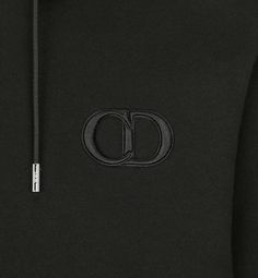 The hooded sweatshirt is crafted in black cotton fleece. Soft and comfortable, it is enhanced by a tonal CD Icon embroidery on the chest. Its regular fit, completed with ribbed cuffs and hem, will pair with any casual attire.. XS Luxury Black Sweatshirt With Embroidered Logo, Luxury Black Hoodie With Ribbed Cuffs, Luxury Hooded Sweatshirt With Logo Detail, Luxury Black Sweatshirt For Streetwear, Luxury Black Hoodie For Fall, Luxury Black Cotton Sweatshirt, Luxury Black Hoodie For Winter, Luxury Black Sweatshirt For Fall, Luxury Black Hoodie With Double-lined Hood