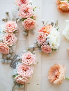 pink and white flowers are arranged next to each other on a piece of paper that says love