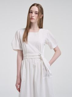 This product is designed with versatility in mind, featuring a 2-way sleeve that allows for multiple styling options. The inclusion of a belt accentuates the waistline, providing a flattering silhouette to this belted dress. Its mid-length hem offers a classic and sophisticated look, suitable for various occasions. - The dress comes with a detachable belt to cinch the waist for a tailored fit.- Puff sleeves can be worn two ways, adding a touch of elegance and adaptability.- Crafted with a subtle A-line cut that gracefully complements the figure.- Complete with a concealed back zipper for a seamless look and easy wear. Summer Belted Dress With Fitted Waist, Summer Dress With Belt Detail, Fitted Summer Midi Dress With Belt, Fitted Midi Dress With Belt For Summer, Elegant Belted Mini Dress For Summer, Chic Belted Square Neck Dress, Chic Belted Summer Dress, Chic Square Neck Belted Dress, Chic Summer Dress With Belt