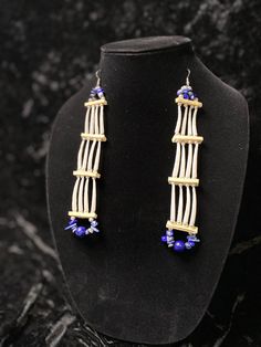 3 Tiered Dentallium Shell Earrings. Stainless steel beads, semi precious lapis lazuli stone and stone chips.  Sterling silver earring hooks. Handmade by indigenous artist from the Lakota Nation. Artisan Dangle Earrings With Polished Beads, Stone Chips, Lapis Lazuli Stone, Shell Earrings, Earring Hooks, Silver Earring, Lapis Lazuli, Beaded Earrings, Bead Work