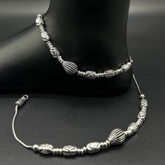 Name of product: Silver Light Weight Anklet / Silver Payal FREE EXPRESS SHIPPING Weight: 32 grams. Length: 27.5centimeter  -----Feedback::- A satisfied customer is our top priority and your feedback forms the backbone of our success. Don't forget to give positive feedback along with good ratings. Thank You Elegant Adjustable Anklets With Oxidized Finish, Adjustable Silver Anklet With Oxidized Finish, Adjustable Silver Oxidized Anklets, Elegant Adjustable Oxidized Anklets, Elegant Adjustable Oxidized Finish Anklets, Silver Payal, Anklet Silver, Silver Anklet, Sterling Silver Anklet