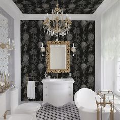 a fancy bathroom with black and white wallpaper, chandelier, bathtub and sink