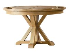 a round wooden table with four leaves on it