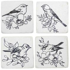 four coasters with birds on them and flowers in the middle one is black and white