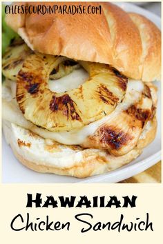 the hawaiian chicken sandwich has pineapple slices on it and is ready to be eaten