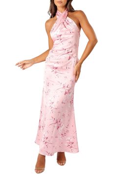 A stunning floral pattern blossoms on a smooth satin dress complete with a halter neckline. Hidden back-zip closure Halter neck Sleeveless Lined 100% polyester Hand wash, line dry Imported Spring Satin Sleeveless Dress With Fitted Bodice, Sleeveless Satin Dress With Fitted Bodice For Spring, Silk Halter Dress With Fitted Bodice, Spring Prom Halter Neck Satin Dress, Pink Satin Maxi Dress With Floral Print, Floral Print Satin Maxi Dress For Prom, Prom Floral Print Satin Maxi Dress, Satin Halter Dress With Fitted Bodice, Fitted Satin Maxi Dress With Floral Print