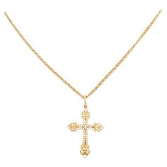 Luxury Fine Jewelry Cross Necklace, Luxury Cross Jewelry With Pave Setting, Luxury Cross Pendant Jewelry With Pave Setting, Luxury Diamond Accents Cross Necklace, Classic Luxury Yellow Gold Cross Necklace, Luxury Yellow Gold Cross Necklace, Luxury Pendant Cross Necklace With Diamond Accents, Luxury Cross Necklace With Diamond Accents, Luxury Cross Pendant Necklace With Diamond Accents