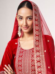 This stunning red color suit features intricate sequin work, zari work, and embroidered details that will make you stand out at any festival, function, or event. The velvet material adds a touch of luxury to the ensemble, while the coordinating santoon pants and net dupatta complete the look.
This gorgeous pink salwar suit is un-stitched and can be customized up to 42 inches, making it easy and convenient to wear. The embroidered and sequin work on the pants and dupatta adds an extra touch of el Red Velvet Pants, Women Salwar Suit, Velvet Pant, Suit With Dupatta, Lehenga Crop Top, Celana Fashion, Indian Pink, Lehenga Choli Wedding, Weddings Receptions