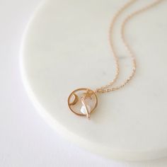 "Beautiful and lovely universe charm necklace made of rose gold moon, star and saturn universe round charm with skinny rose gold plated brass chain. Simple and warm. The necklace is good for yourself or gift! Your necklace will ship in a rudiana gift box. ♥Chain length 14\"- 18\" ♥Charm 1/2\" ♥Rose gold plated over brass / Opal stone ♥ Delivery Time Fast shipping within 1 - 3 days ♥ See more Rudiana Accessories Rudiana.etsy.com" Necklace Planet, Saturn Necklace, Planet Necklace, Celestial Necklace, Pendent Necklace, Gold Moon, Moon Star, Opal Stone, Jewelry Stand