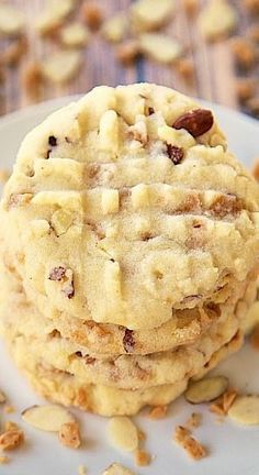 a stack of cookies sitting on top of a white plate